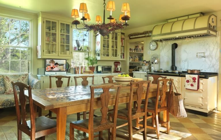 Ceiling-lamps-in-vintage-style-and-wooden-furniture-Italian-kitchen-interior